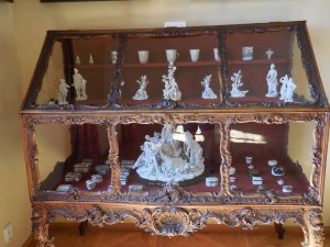 Meissen porcelain in a Rococo cabinet